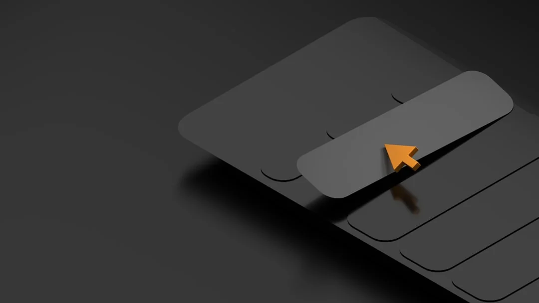 Portable computer with website representing assorted abstract photos under favorites and browser search engine with magnifier symbol